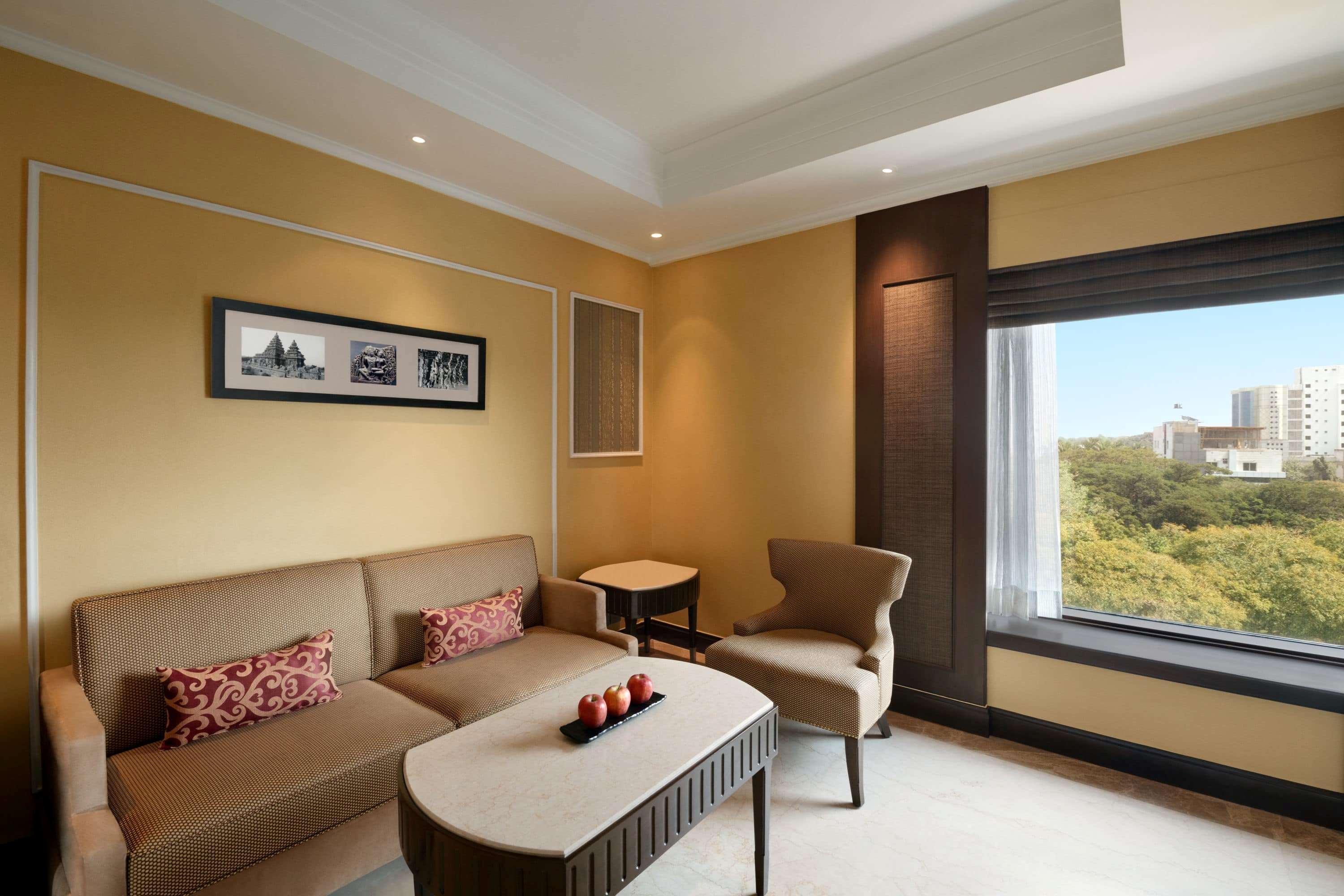 Hotel Ramada Plaza Chennai Exterior foto A living room in a suite at the Taj Mahal Palace, Mumbai